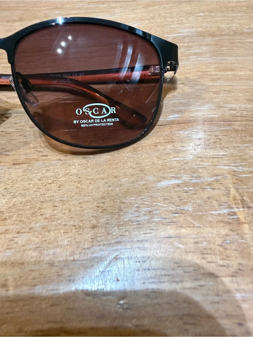 OSCAR by Oscar De la rent a black cat eye frame sunglasses